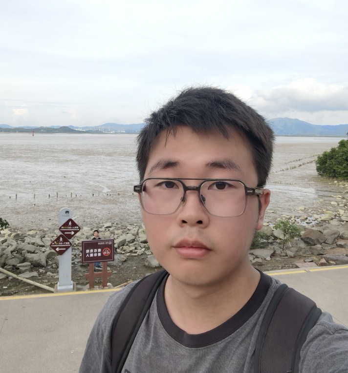 A photo of Wenyong Yao showing a man with short black hair